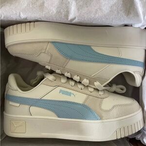 New women’s size 8 pumas